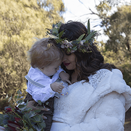 Bride holding her child at a Blue Mountains Elopement